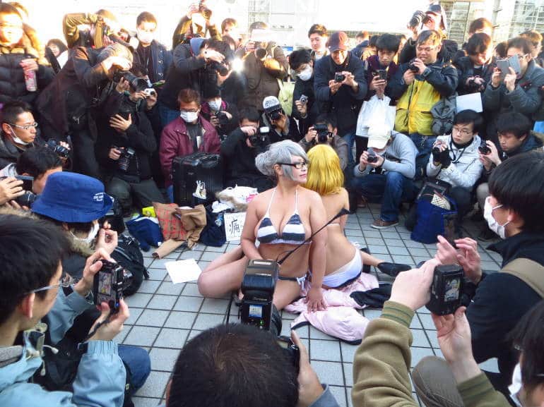 Bikini-clad women. In winter.